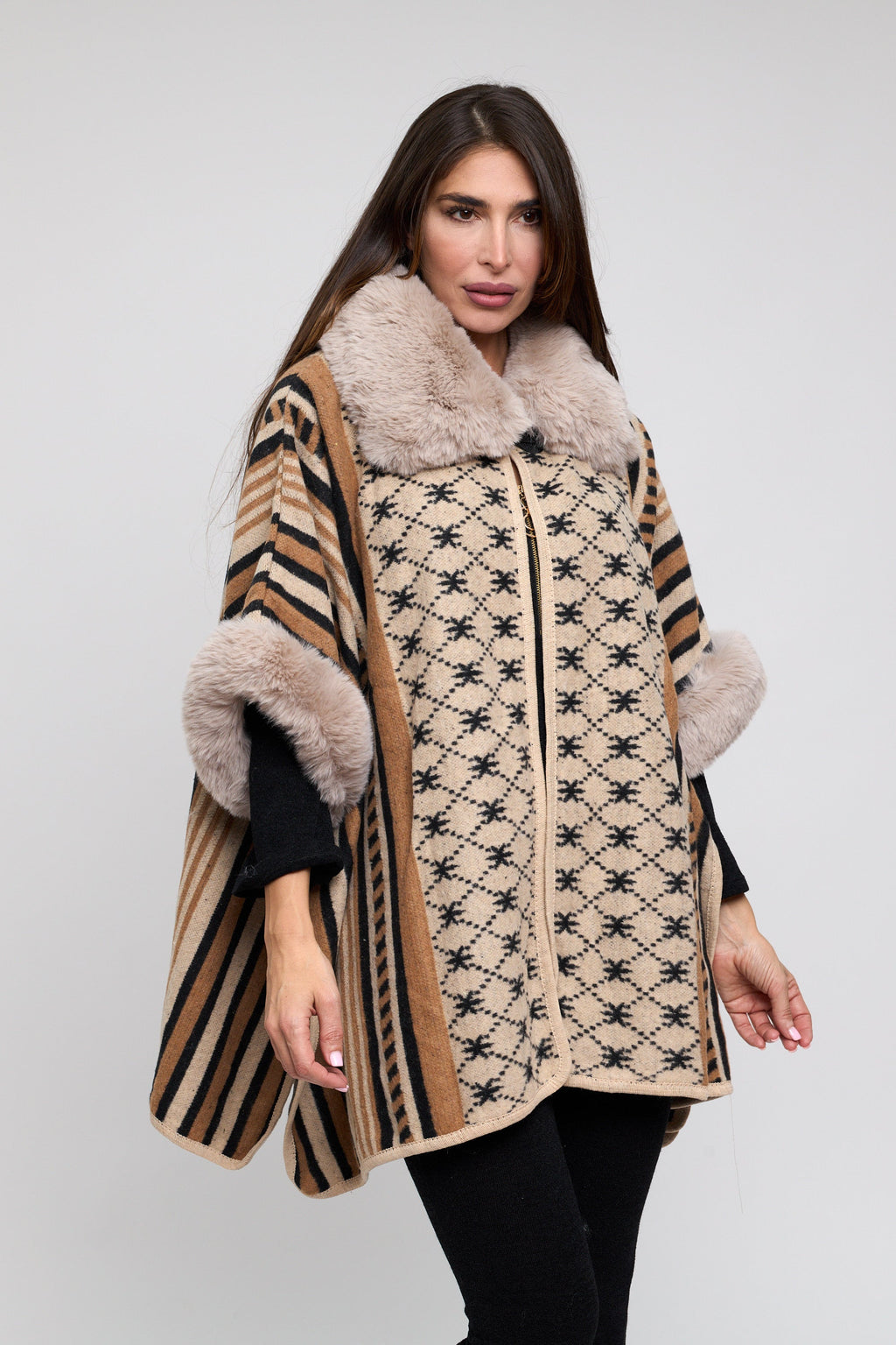 Striped cape with fur collar. Top closure.